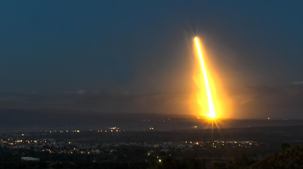 A SpaceX Falcon 9 rocket launches two demonstration satellites in February 2018 from Vandenberg Air Force Base for the company's planned constellation. SpaceX's constellation could see competition from Amazon.