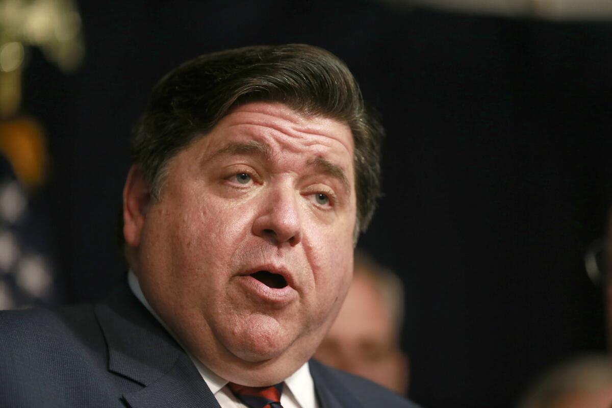 FILE - In this Wednesday, June 5, 2019, file photo, Gov. J.B. Pritzker speaks in downtown Chicago. On Friday, Aug. 30, 2019, Pritzker said he's erased the drug conviction of Army veteran Miguel Perez Jr. who was deported to Mexico in 2018, a step that Perez's supporters hope will help him return to the U.S. (AP Photo/Amr Alfiky, File)