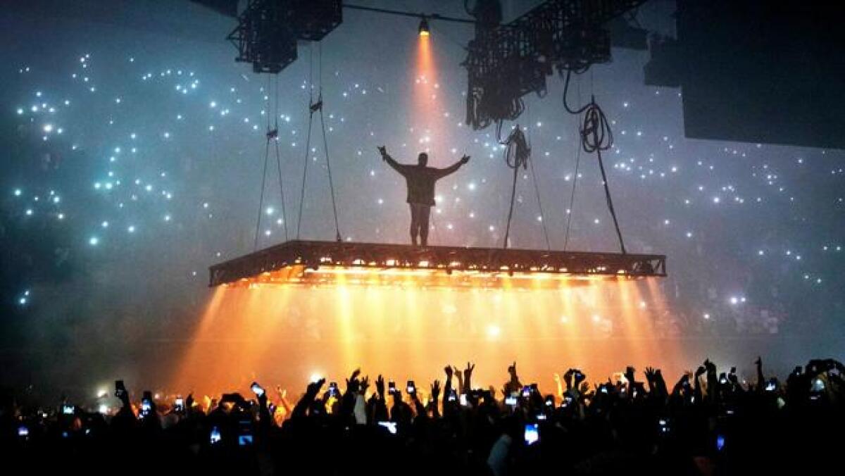 Kanye West, seen performing at the Forum last month, was among Grammy nominees announced Tuesday.