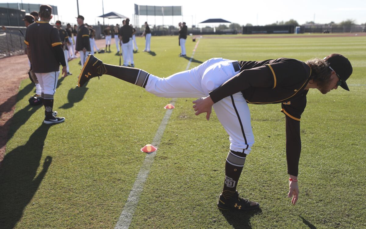 Padres pitcher Chris Paddack stretches during spring training at the Peoria Sports Complex on Friday, February 14, 2020 in Peoria, Arizona.
