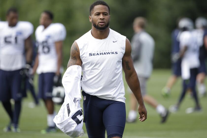 Seahawks All-Pro safety Earl Thomas walks off the field after a training camp practice in Renton, Wash.