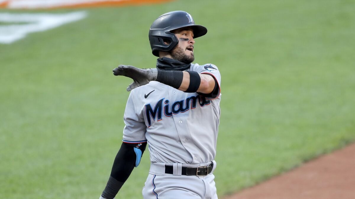 Eddy Alvarez swings at a pitch during a game between the Miami Marlins and Baltimore Orioles during a game in August 2020.