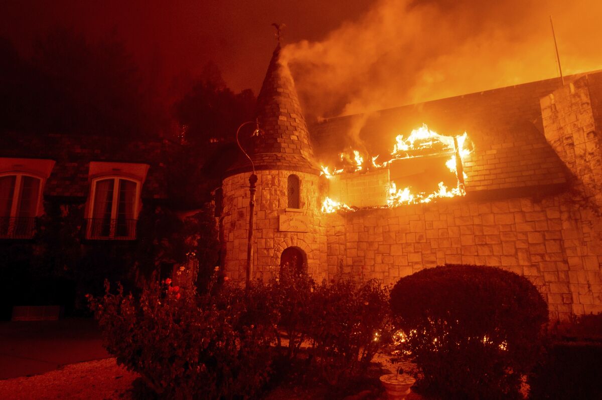 Flames from the Glass fire consume Chateau Boswell Winery in St. Helena.