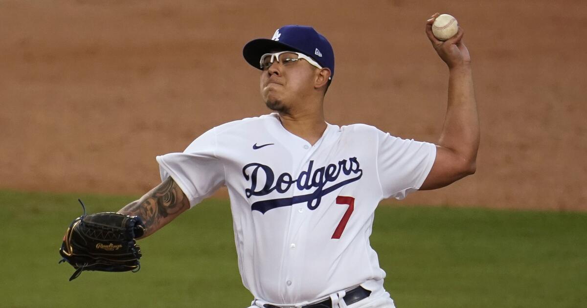 Dodgers pitcher Julio Urias works register at Jack in the Box for charity –  Daily Breeze