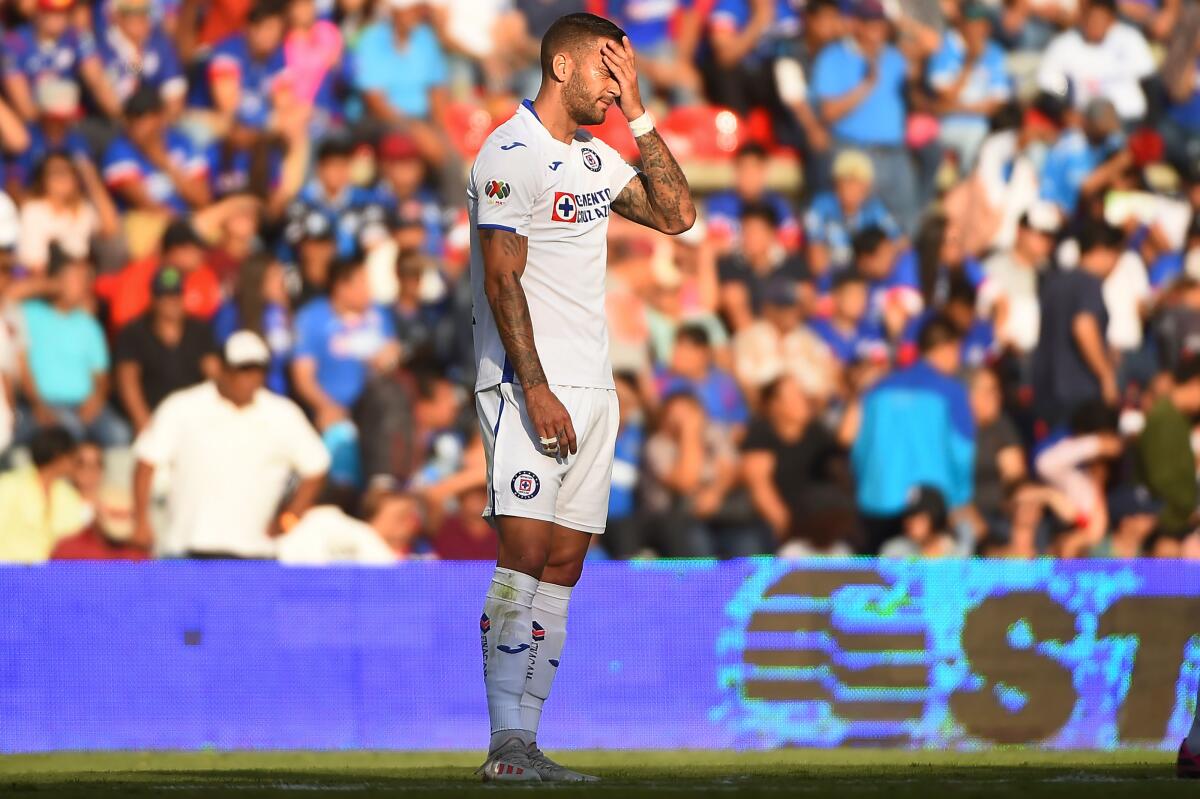 Edgar Mendez of Cruz Azul gestures during the Mexican Apertura 2019 tournament football against Queretaro at La Corregidora stadium in Queretaro, Queretaro state, Mexico on August 3, 2019. (Photo by OMAR MARTINEZ / AFP)OMAR MARTINEZ/AFP/Getty Images ** OUTS - ELSENT, FPG, CM - OUTS * NM, PH, VA if sourced by CT, LA or MoD **