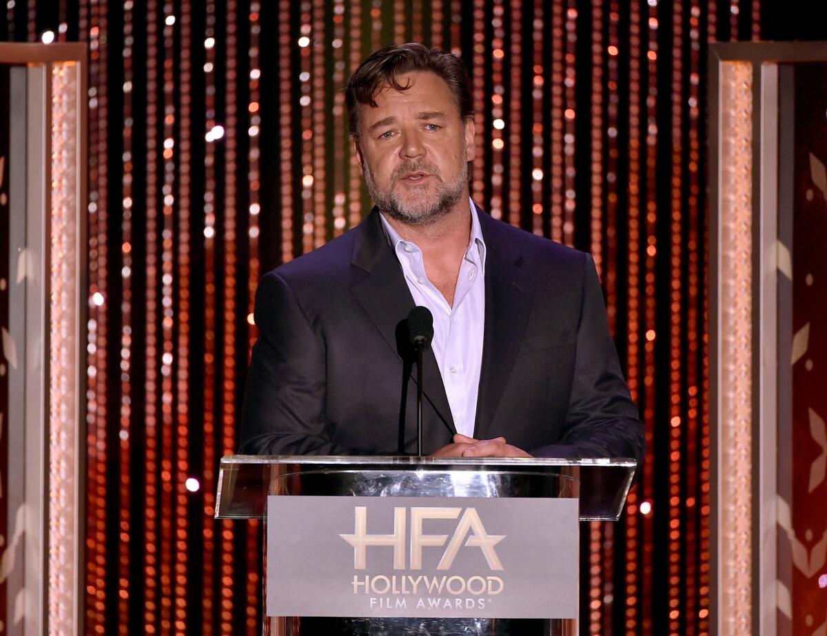 Actor Russell Crowe blasts Virgin Australia for hoverboard ban.