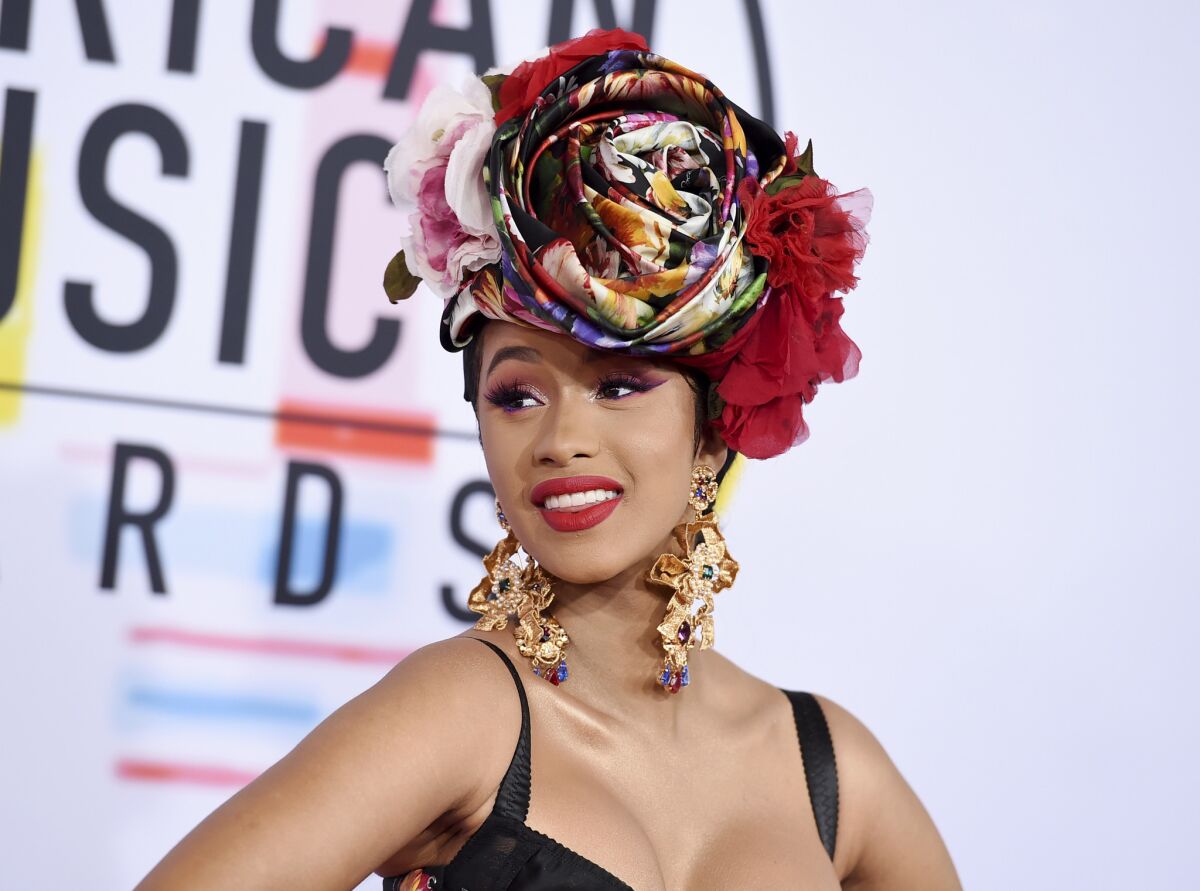 Cardi B arrives at the American Music Awards at the Microsoft Theater in Los Angeles on Oct. 9.