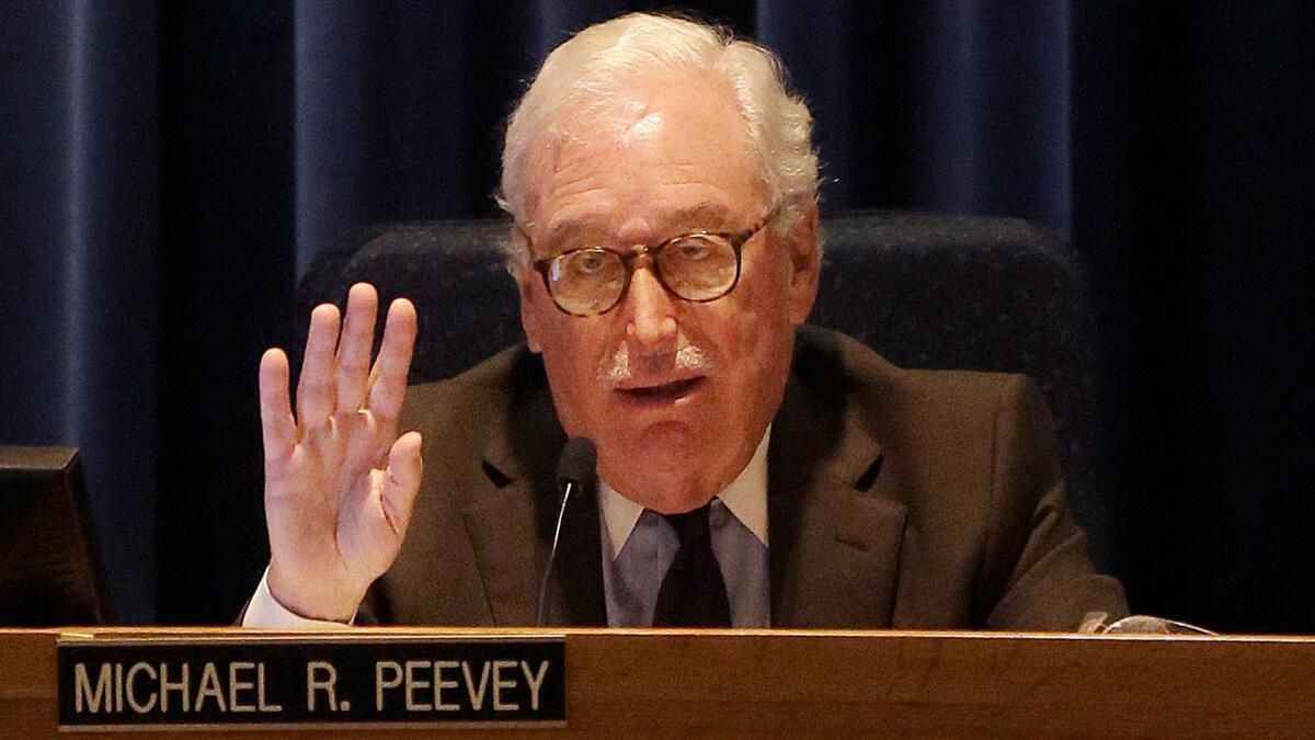 Michael Peevey, former president of the California Public Utilities Commission, speaks during a PUC meeting in San Francisco in late 2014.