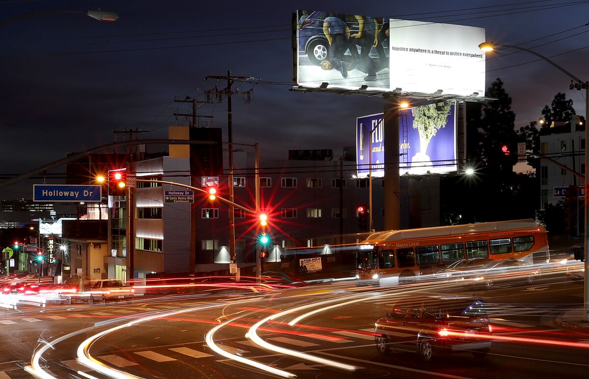 WeHo billboard depicting the death of George Floyd at the hands of Minneapolis police. 