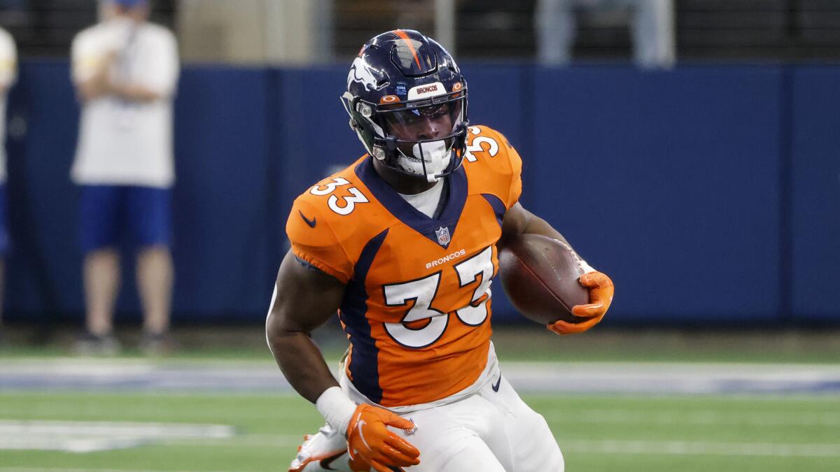 Denver Broncos running back Javonte Williams runs against the Dallas Cowboys.