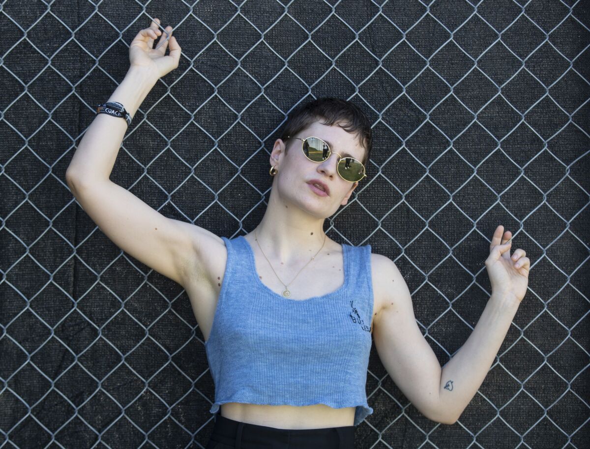 Héloïse Letissier of Christine and the Queens backstage at the Coachella. (Brian van der Brug / Los Angeles Times)