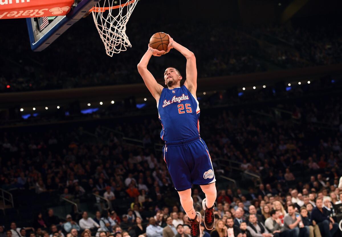 Clippers guard Austin Rivers goes up for a dunk on a breakaway in the first half against the Knicks.