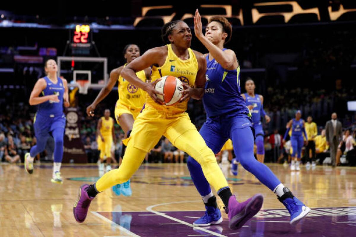 Sparks forward Nneka Ogwumike drives to the basket during a game against the Dallas Wings.