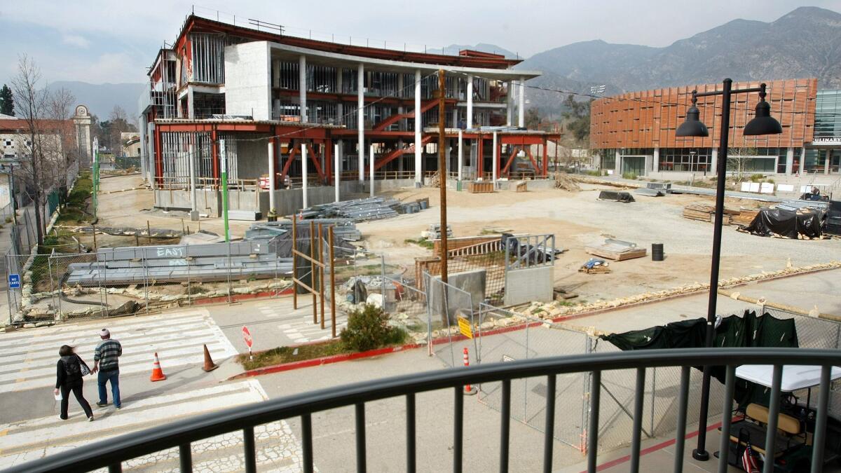 The Media Arts Building, left, shown under construction in 2012, alongside the completed Culinary Arts Institute, right, on the campus of Los Angeles Mission College in Sylmar. The campus is part of the Los Angeles Community College District.