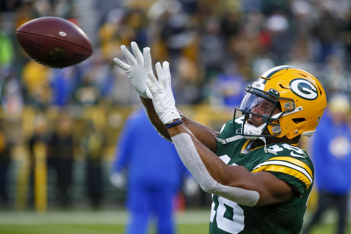 Green Bay Packers' Randall Cobb warms up before an NFL football game against the Los Angeles Rams Sunday, Nov. 28, 2021, in Green Bay, Wis. (AP Photo/Matt Ludtke)