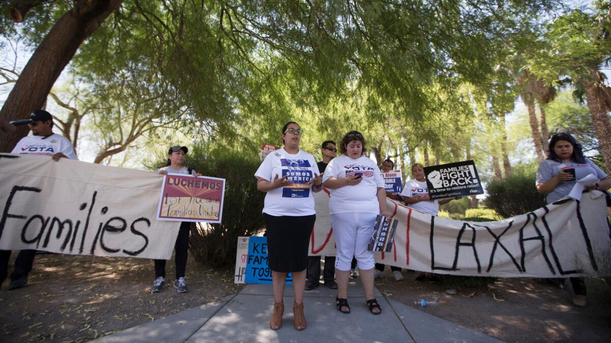 Protestors address the Supreme Court's tie vote that blocks the Deferred Action for Parents of Americans and Lawful Permanent Residents program at the Grant Sawyer Building in Las Vegas.