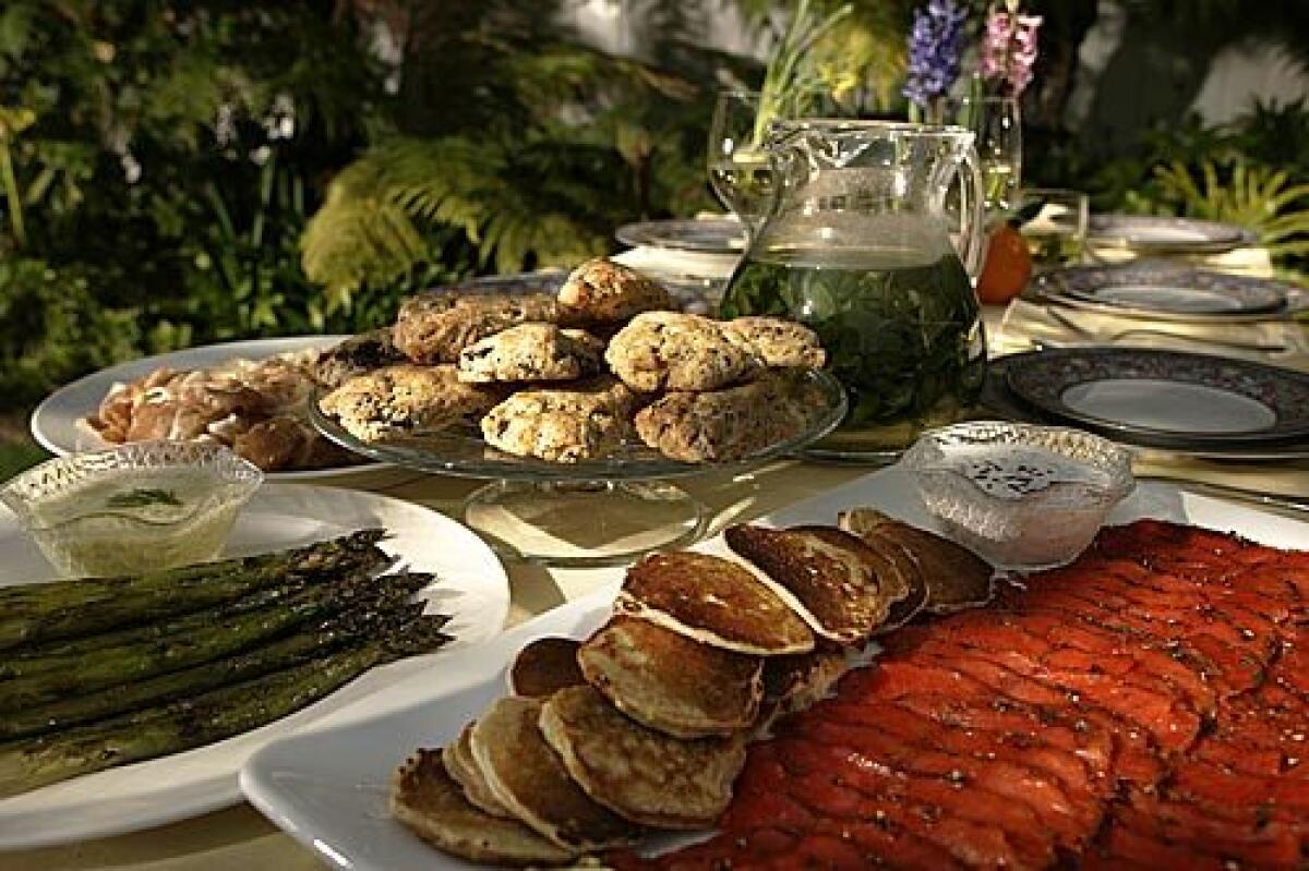 BRUNCH SPREAD: The menu includes chocolate-orange scones, pan-roasted asparagus with dill Hollandaise sauce and fennel-aquavit gravlax with caraway creme fraiche and leek pancakes.