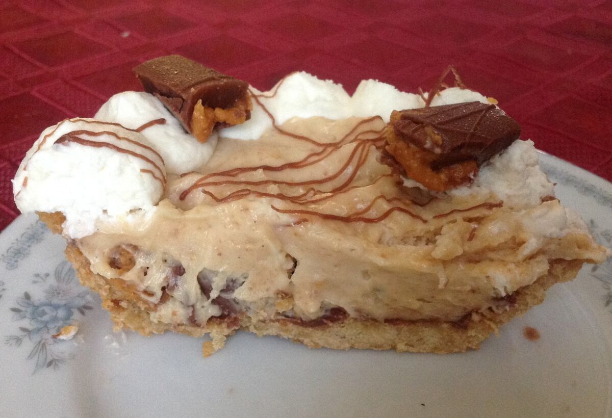 Cross-section of the Peanut Butta' Pie, which features homemade peanut butter and Belgian chocolate. — Pam Kragen