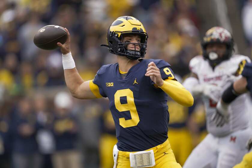 Michigan quarterback J.J. McCarthy throws against Maryland in the second half of an NCAA college football game in Ann Arbor, Mich., Saturday, Sept. 24, 2022. (AP Photo/Paul Sancya)