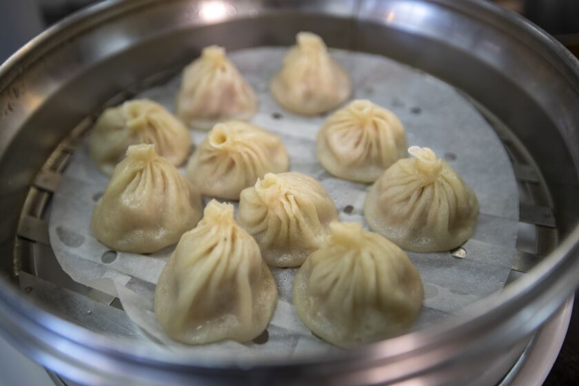 ALHAMBRA, CALIF. -- SUNDAY, JULY 28, 2019: Detail of xiao long bao (soup dumplings) at the Kang Kang Food Court in Alhambra Sunday, July 28, 2019. Director and writer Lulu Wang, whoÕs recent movie, the Farewell, talks about the role food plays in the movie. (Allen J. Schaben / Los Angeles Times)