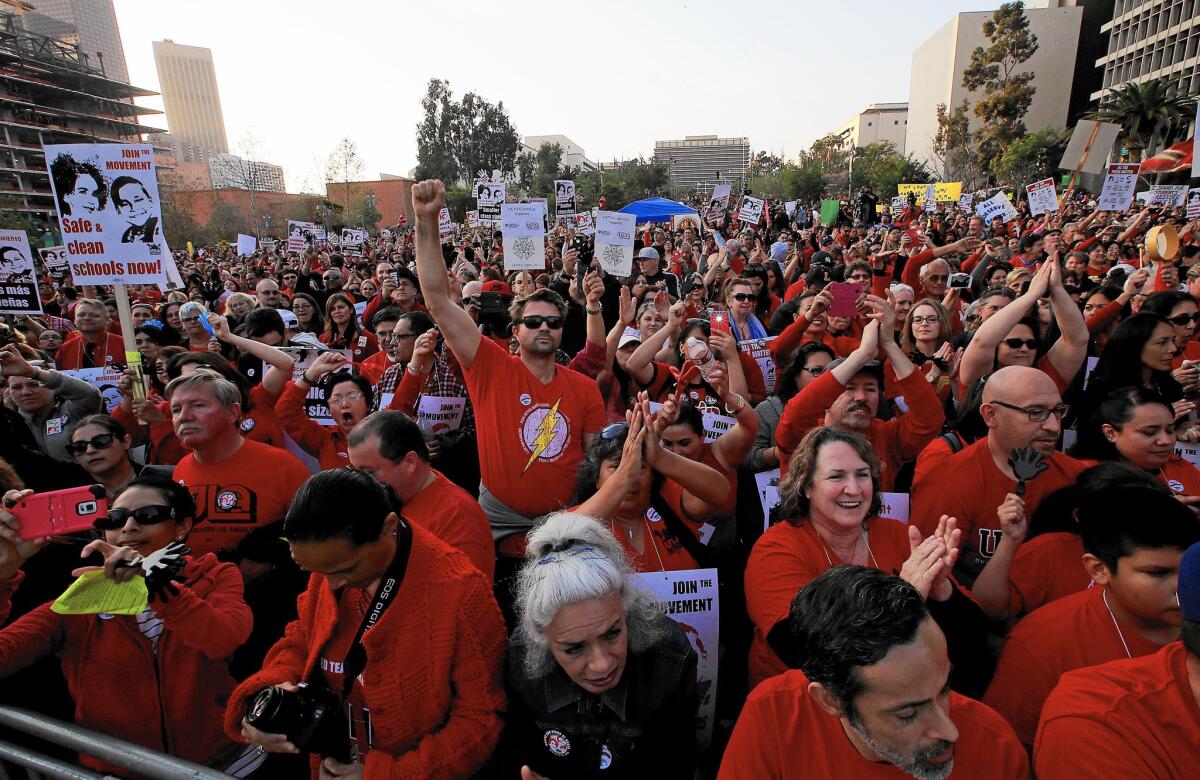 Members of United Teachers Los Angeles press their contract demands at a recent rally in downtown's Grand Park.