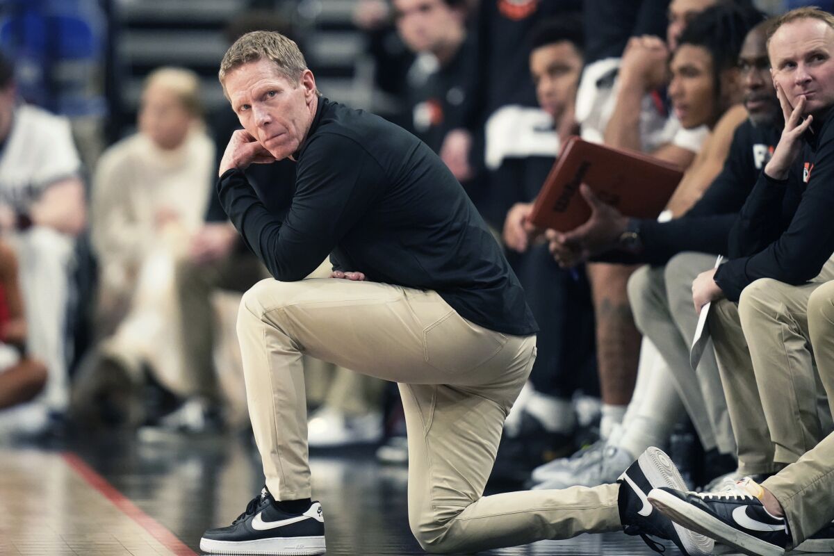 Gonzaga coach Mark Few watches during the first half of the team's NCAA college basketball game against Xavier in the Phil Knight Legacy tournament Sunday, Nov. 27, 2022, in Portland, Ore. (AP Photo/Rick Bowmer)
