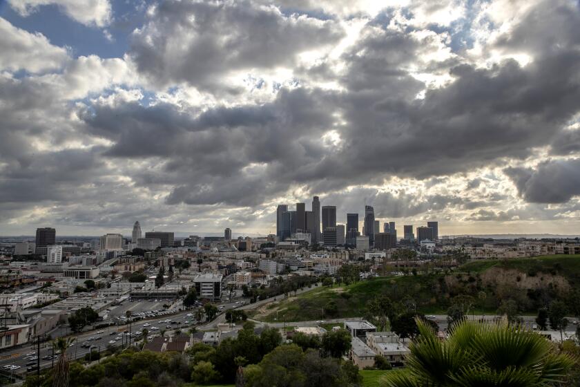 LOS ANGELES, CA, THURSDAY, JANUARY 16, 2020 — A cold weather front moves over downtown LA. (Robert Gauthier/Los Angeles Times)