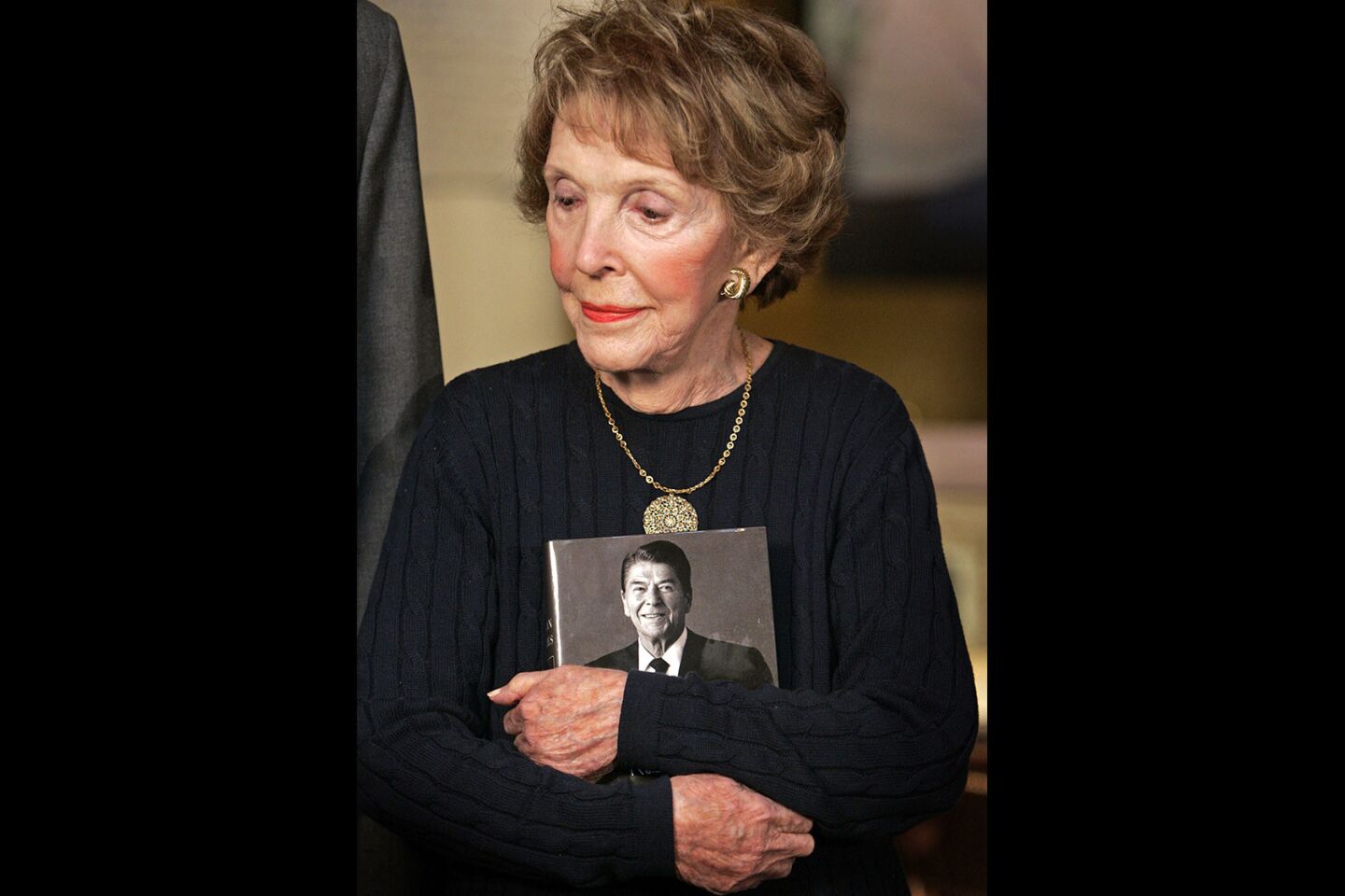 In May 2007, Nancy Reagan holds a copy of the newly released "Reagan Diaries," which chronicles her husband's two terms in the White House.