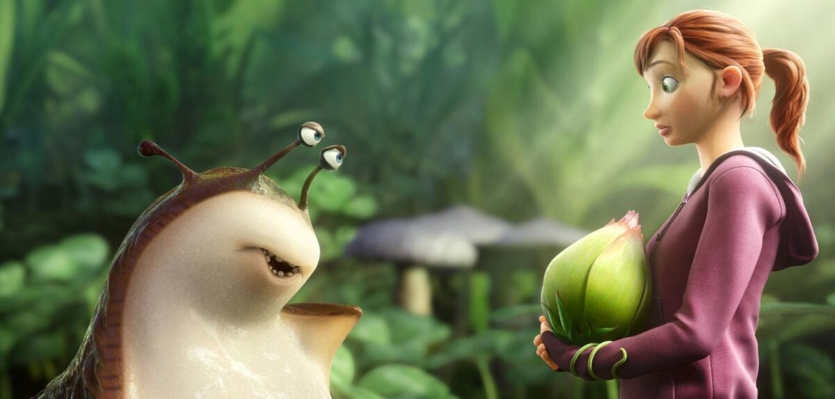 Mub, voiced by Aziz Ansari, left, and MK, voiced by Amanda Seyfried, in a scene from the animated film, "Epic."