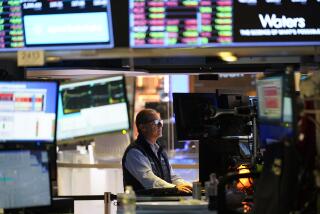 Traders work on the floor at the New York Stock Exchange in New York, Wednesday, July 26, 2023. (AP Photo/Seth Wenig)
