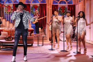 Jimmie Allen, left, and the Shindellas "CMA Country Christmas" on ABC.