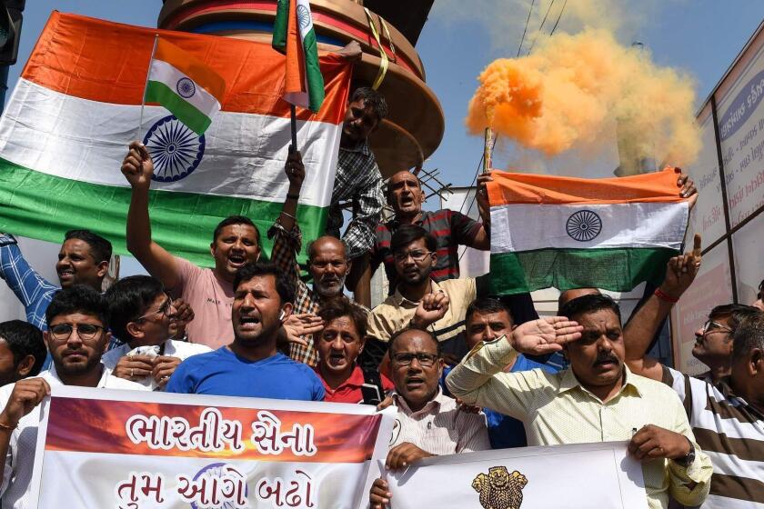 Indian residents participate in a demonstration to support Indian armed forces in Ahmedabad on February 26, 2019, following an Indian Air Force (IAF) strike launched on a Jaish-e-Mohammad (JeM) camp at Balakot. - An air strike February 26 on a militant camp killed "a very large number" of fighters preparing an attack on India, a senior foreign ministry official said after Pakistan accused it of crossing into its airspace. (Photo by SAM PANTHAKY / AFP)SAM PANTHAKY/AFP/Getty Images ** OUTS - ELSENT, FPG, CM - OUTS * NM, PH, VA if sourced by CT, LA or MoD **