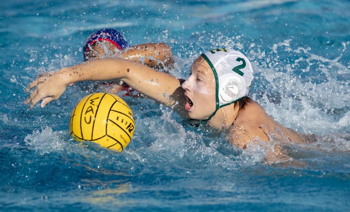 Edison High senior Cameron Davidson breaks for the goal against Los Alamitos in a Wave League match at Corona del Mar High on Oct. 17, 2018.