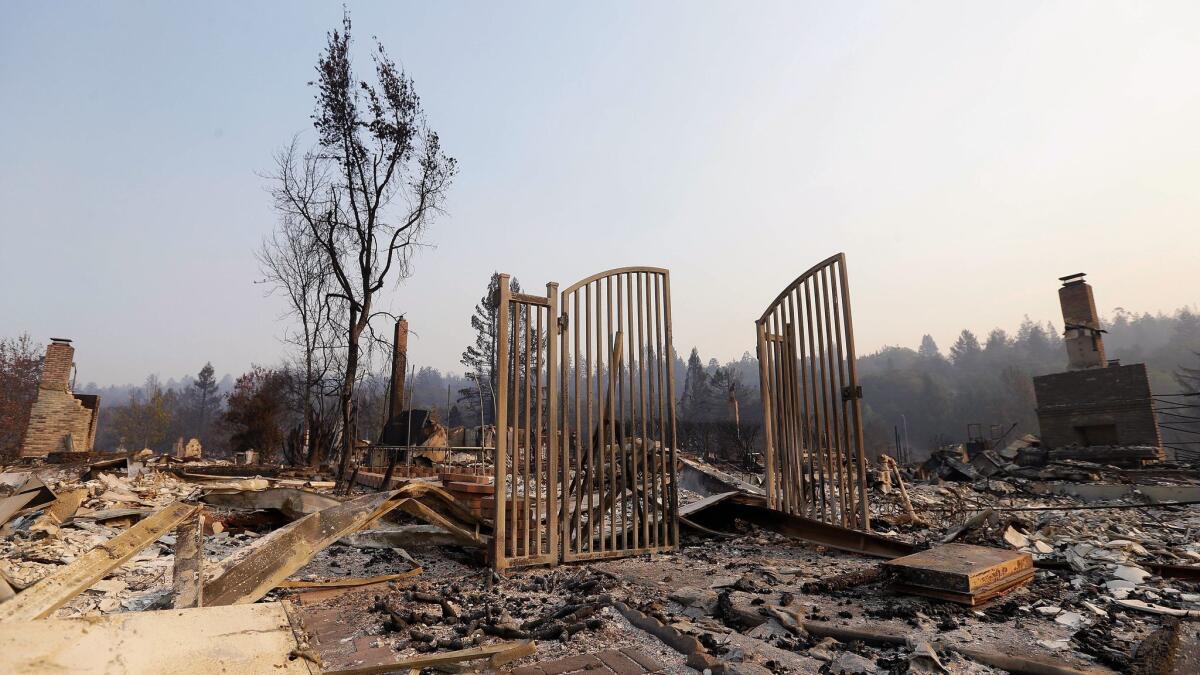 The remains of homes destroyed by fires are seen in Santa Rosa, Calif., on Oct. 12.