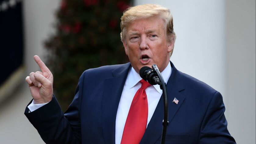 President Trump speaks during an event to present golfer Tiger Woods with the Presidential Medal of Freedom in the Rose Garden of the White House in Washington on May 6, 2019.