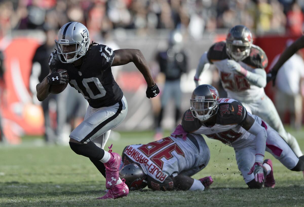 Raiders wide receiver Seth Roberts (10) runs past the Tampa Bay Buccaneers defense for a 41-yard touchdown during overtime on Oct. 30.