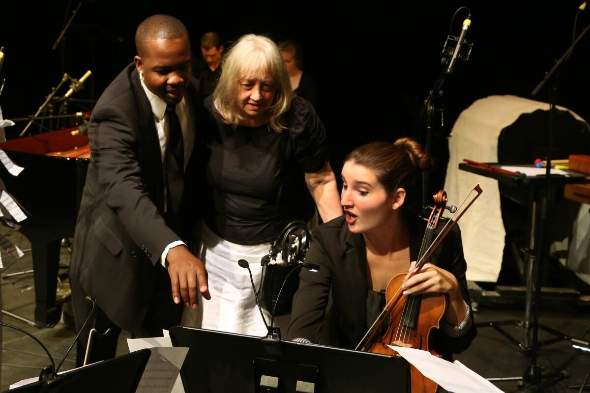 Gloria Coates, center, with Babatunde Akinboboye and Emily Call at REDCAT. Coates has written 16 symphonies but is considered a musical outsider.