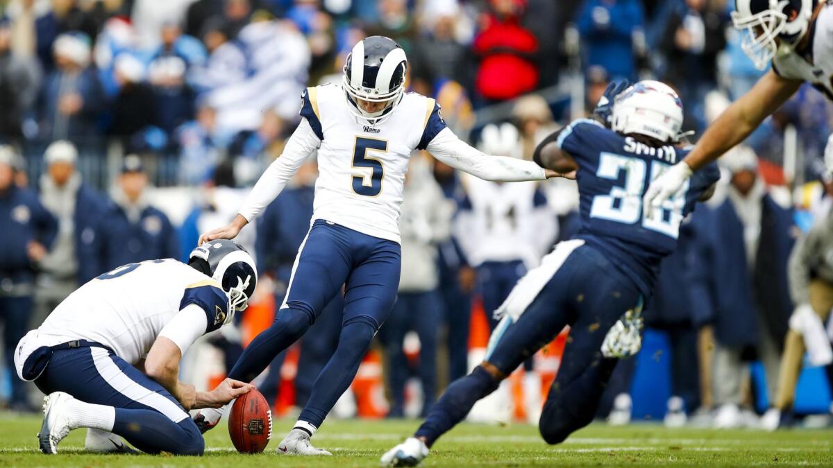 Kicker Sam Ficken of the Los Angeles Rams kicks a field goal against the Tennessee Titans.