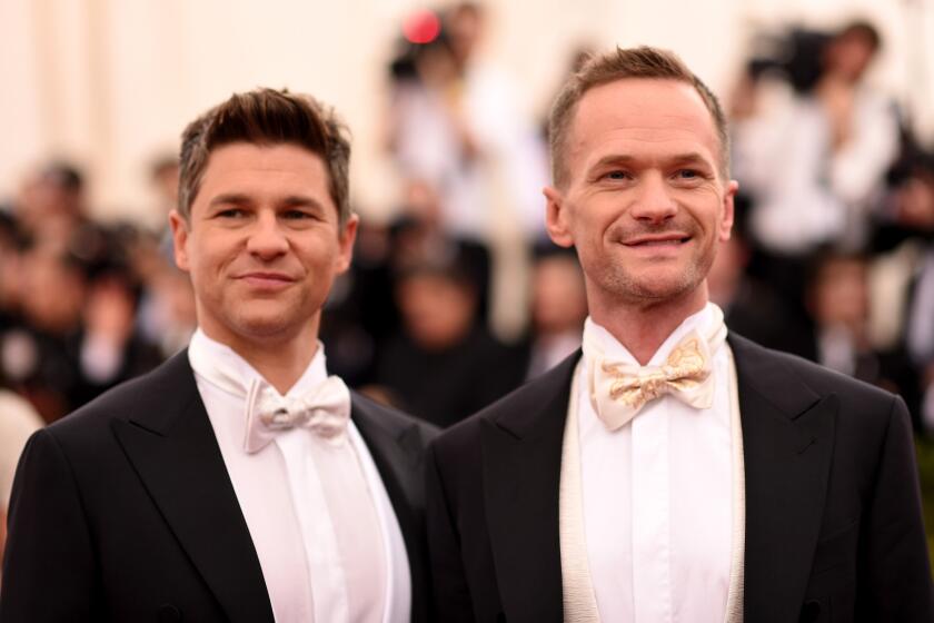 David Burtka and husband Neil Patrick Harris, right, in May. Harris thanked the Supreme Court for its ruling on same-sex marriage in a tweet on Friday.