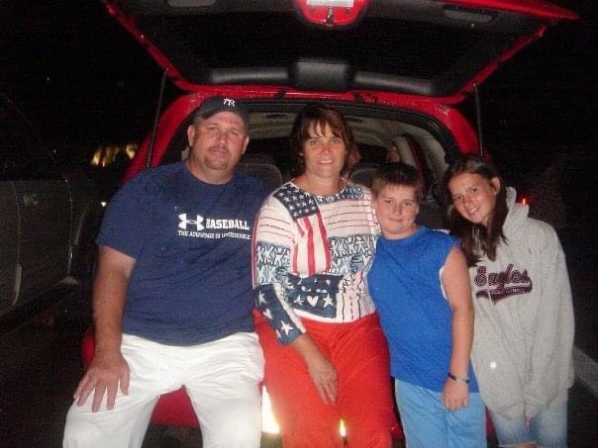 Paul Grattan Jr, second from right, is shown with his father, Paul, mother Patty and sister Caroline in the mid 2000s.