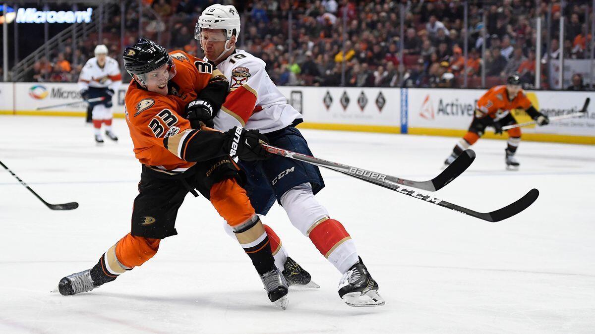 Ducks right wing Jakob Silfverberg shoots the puck while under pressure from Florida Panthers defenseman Michael Matheson during the second period Friday.
