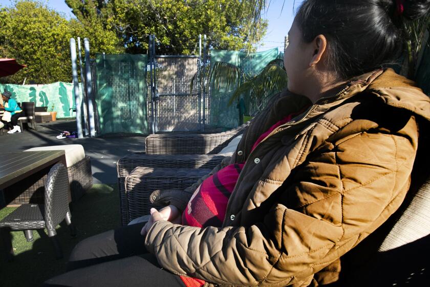 Estafany Ramirez, 23, who is fleeing violence in El Salvador, is eight months pregnant and was released in to the community by CBP to await her hearing. She is now sheltered at the Jewish Family Services shelter and was photographed on Thursday morning February 6, 2020.