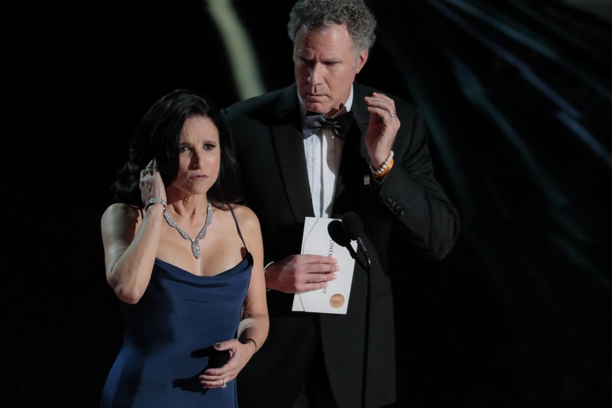 Presenters Julia Louis-Dreyfus and Will Ferrell 