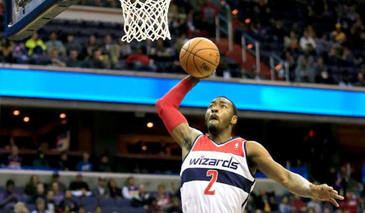 John Wall had 31 points for the Wizards as Washington defeated the Lakers, 116-111, on Tuesday at the Verizon Center in Washington, D.C.