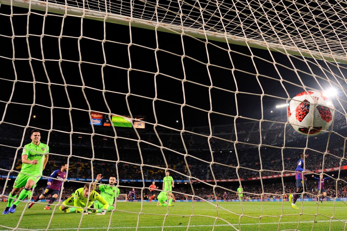 Barcelona's French forward Ousmane Dembele (R) scores a goal during the Spain's Copa del Rey (King's Cup) round of 16 second leg football match between FC Barcelona and Levante UD, at the Camp Nou stadium in Barcelona on January 17, 2019. (Photo by Josep LAGO / AFP)JOSEP LAGO/AFP/Getty Images ** OUTS - ELSENT, FPG, CM - OUTS * NM, PH, VA if sourced by CT, LA or MoD **