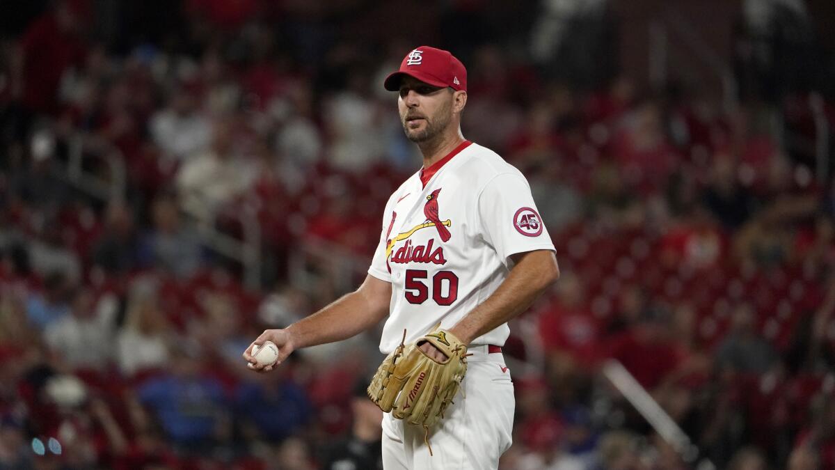 St. Louis Cardinals pitcher Adam Wainwright pauses after giving up a solo home run.