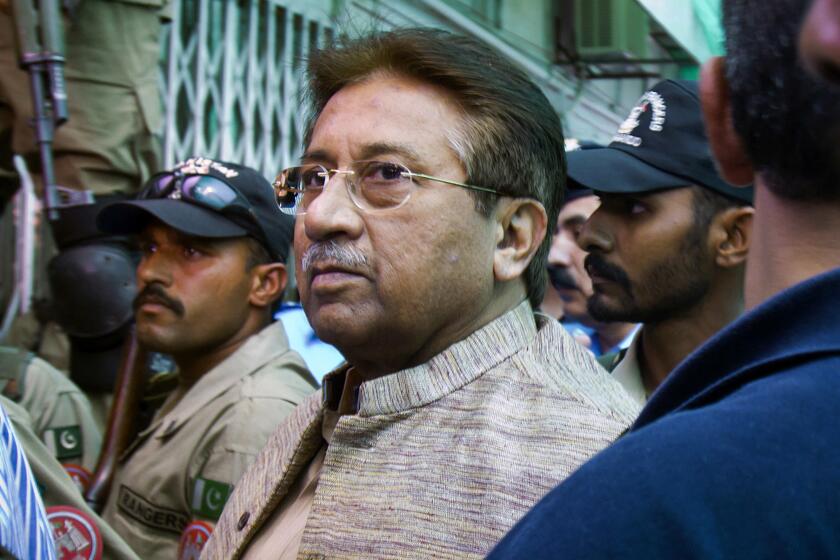 FILE - In this April 20, 2013, file photo, Pakistan's former President and military ruler Pervez Musharraf arrives at an anti-terrorism court in Islamabad, Pakistan. A Pakistani court sentenced the country's former military ruler to death in a treason case relating to the imposition of a state of emergency by him in 2007 when he was in power. Musharraf who is apparently sick and receiving treatment in Dubai where he lives was not present in the courtroom when judges announced ruling on Tuesday, Dec. 17, 2019. (AP Photo/Anjum Naveed, File)