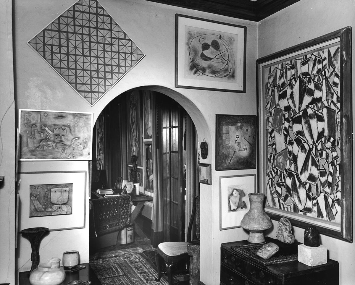 A small Surrealist abstraction by L.A. artist Knud Merrild is above a chest in the corner of the Arensbergs' dining room.