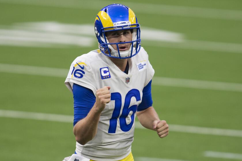 Los Angeles Rams quarterback Jared Goff (16) pumps his fist after tight end Tyler Higbee.