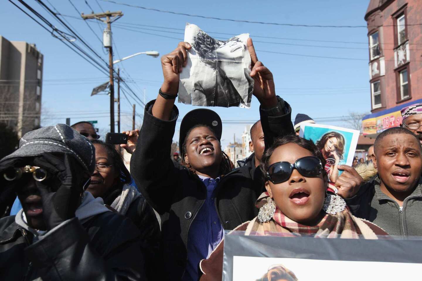 Fans in Newark, N.J., show their appreciation for the late Whitney Houston.